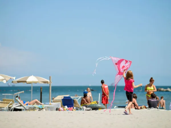 Strandszene am Roan Camping Adriano Village.